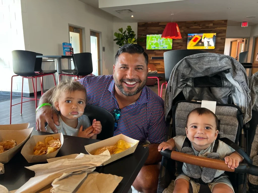 Dr. Hopkinson enjoying some quality time and food with his kids